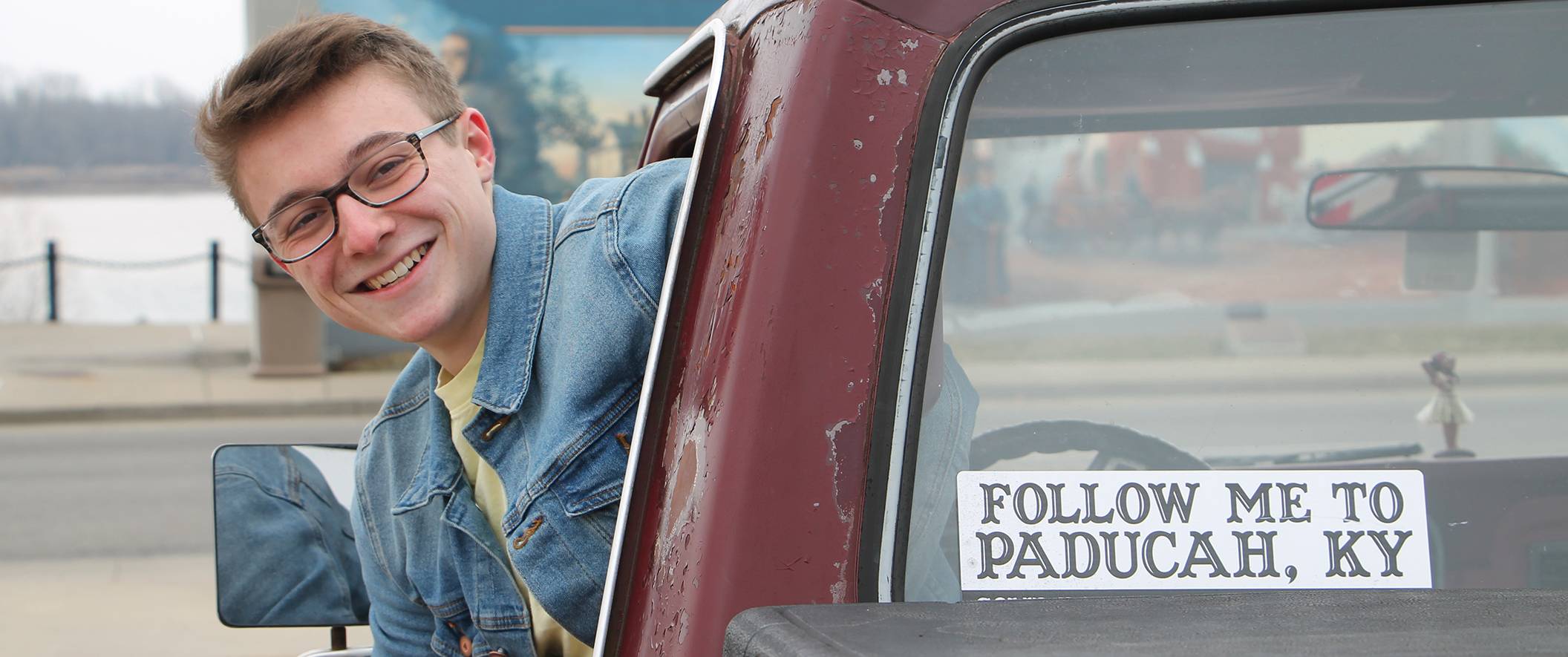 Follow me to paducah bumper sticker on truck